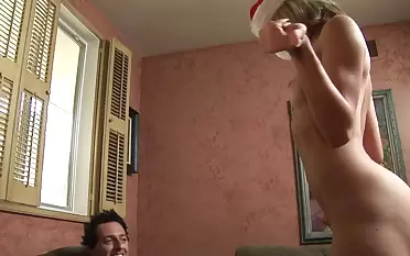 Naughty babe dresses up as santa to give her man a sexy gift